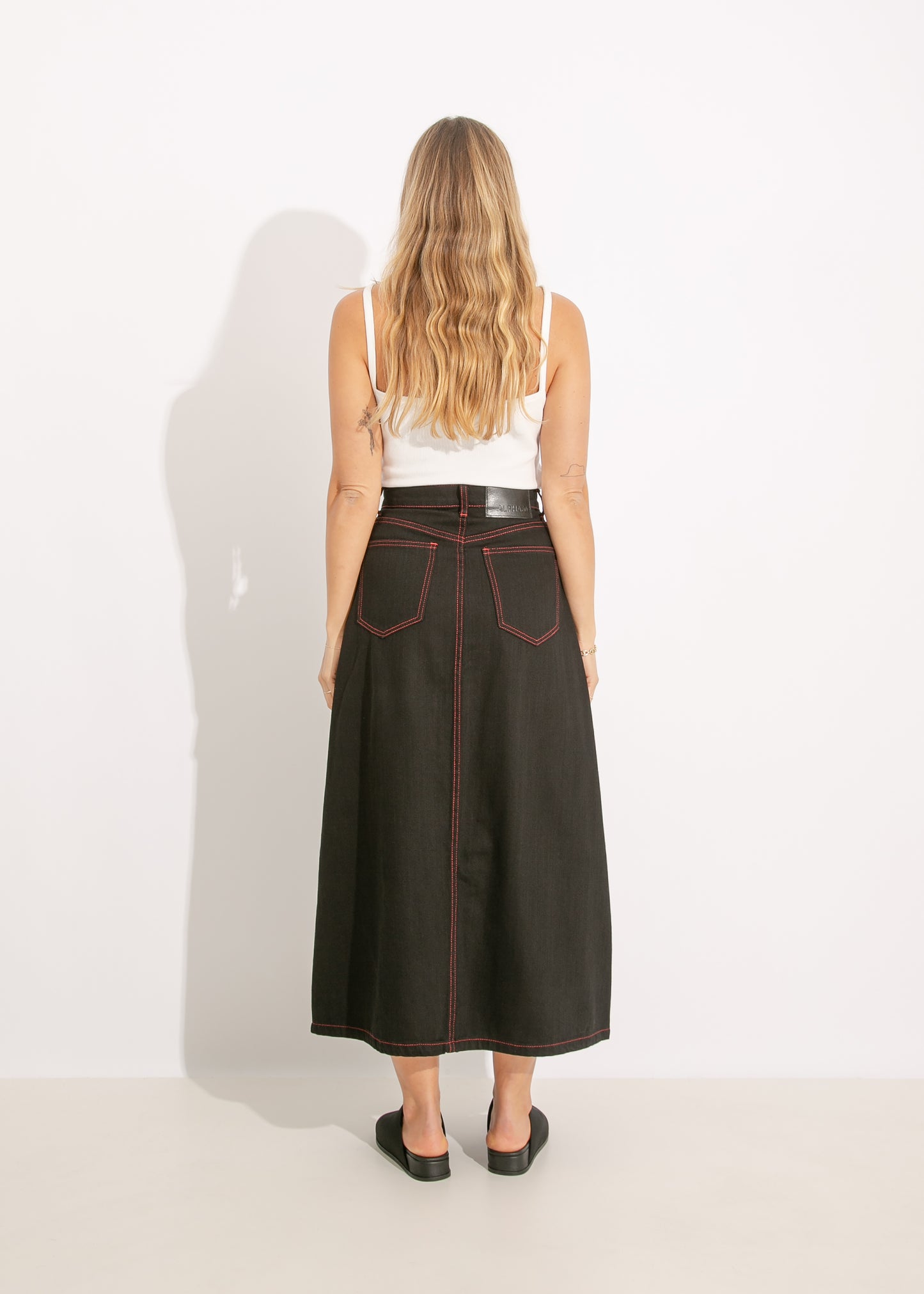 S24 | DEMI SKIRT / BLACK-ORANGE